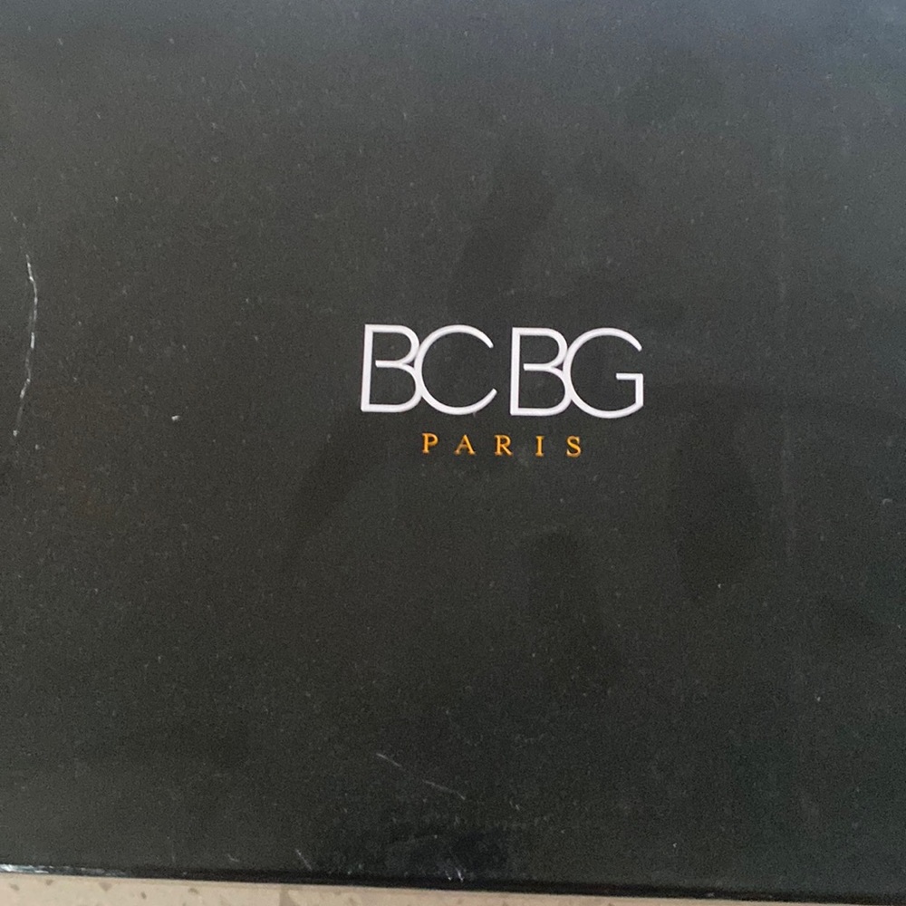 Never worn silver BCBG sandals